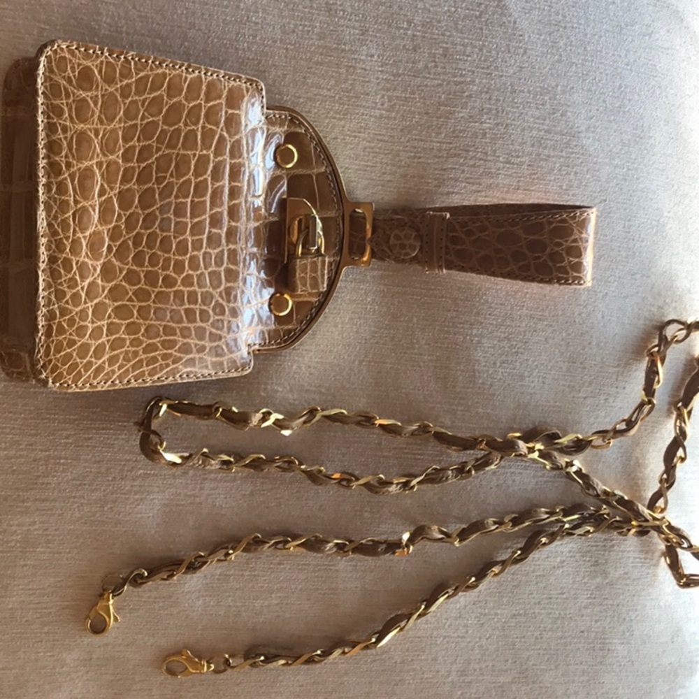 Beautiful crocodile mini bag with belt strap accessory. Giorgio’s Palm Beach.